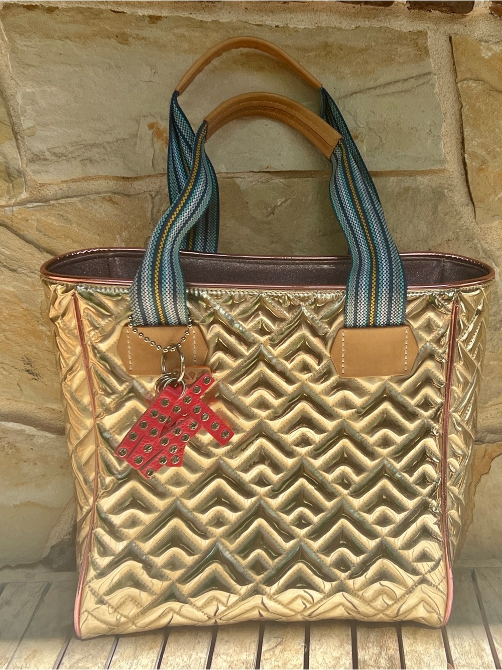 EUC -Consuela Gold Evadney Classic Tote with Bright pink studded MTRA keychain